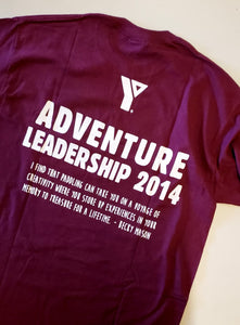 Maroon Adventure Leadership 2014 Tee back, YMCA logo above "ADVENTURE LEADERSHIP 2014" followed by "I FIND THAT PADDLING CAN TAKE YOU ON A VOYAGE OF CREATIVITY WHERE YOU STORE UP EXPERIENCES IN YOUR MEMORY TO TREASURE FOR A LIFETIME - BECKY MASON" All text is in white, caps, and centered on back of shirt.